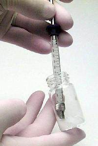 Syringe in vial